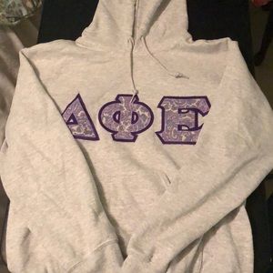 Delta phi epsilon patterned letters hoodie